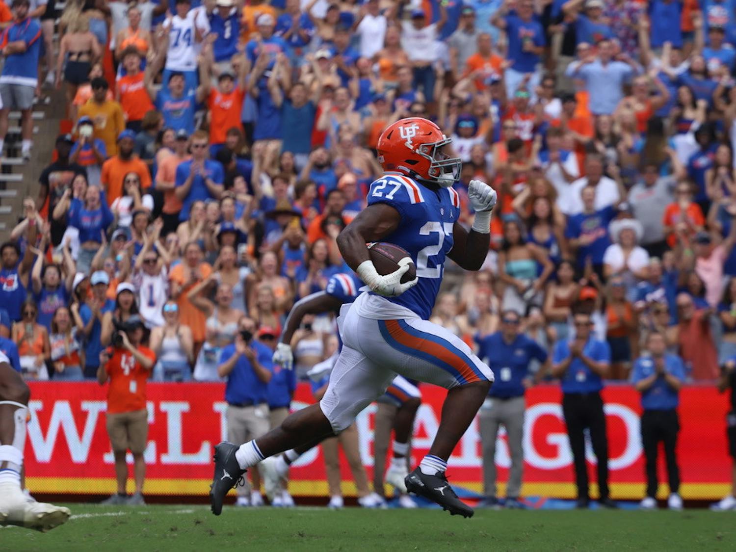 Florida's Dameon Pierce runs downfield away from Vanderbilt defenders during the Gators' 42-0 win on Oct. 9.