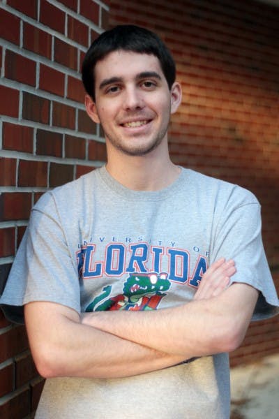 Dustin Buckley poses for a photo on Thursday. Buckley collects Box Tops for Education and sells them online.