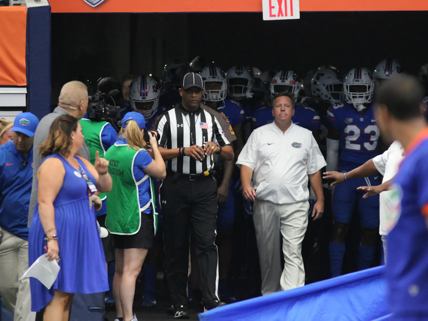 Led by coach Jim McElwain, the Gators take the field against Michigan on Sept. 2 in Arlington, Texas.