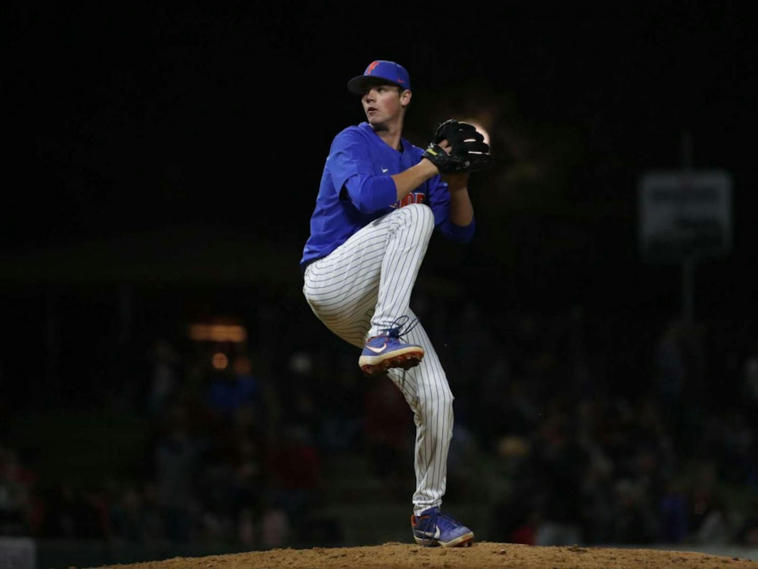 Hunter Barco, a 19-year-old UF business administration freshman, pitches in an exhibition game against Georgia. Barco allowed four runs in a 5-2 loss to the Hurricanes.