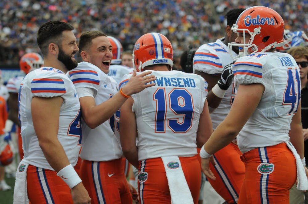 <p>From left: Jonathan Haney, Eddy Pineiro, Johnny Townsend and Ryan Farr celebrate on the sidelines during Florida's 13-6 win over Vanderbilt on Sept. 24, 2016, in Knoxville.</p>
