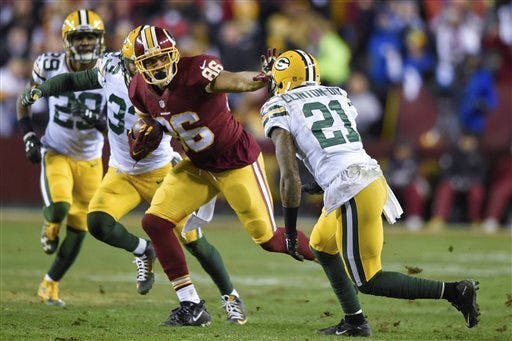 Washington Redskins tight end Jordan Reed (86) pushes back Green Bay Packers free safety Ha Ha Clinton-Dix (21) during the first half of an NFL wild card playoff football game in Landover, Md., Sunday, Jan. 10, 2016. (AP Photo/Nick Wass)