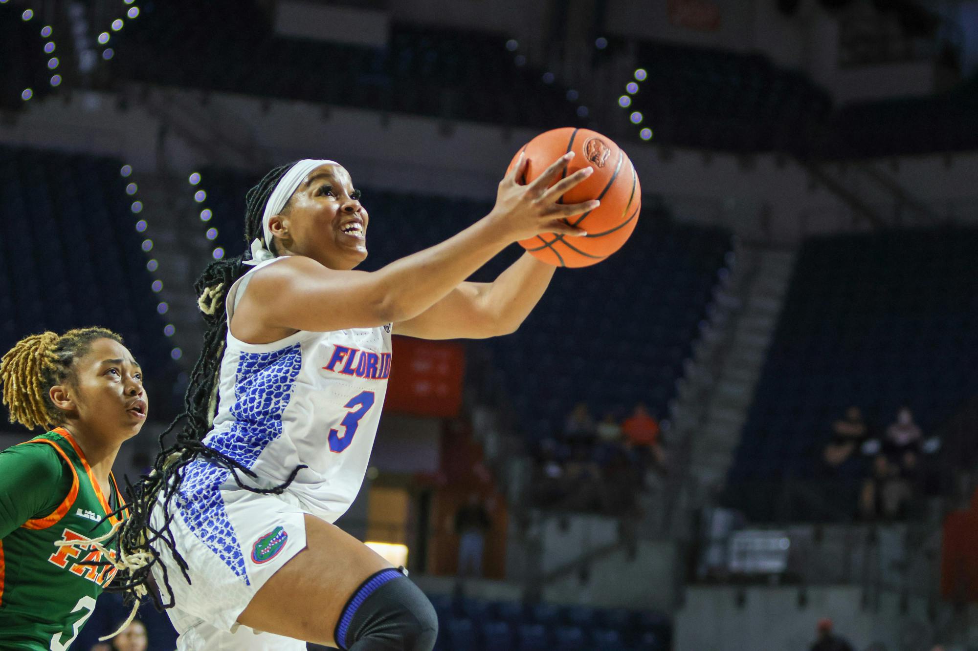 Florida guard KK Deans attacks the basket during the Gators game with Florida A&M Monday, Nov. 7, 2022. Deans lead UF in scoring with 23 points during its loss to the Florida State Seminoles Wednesday.