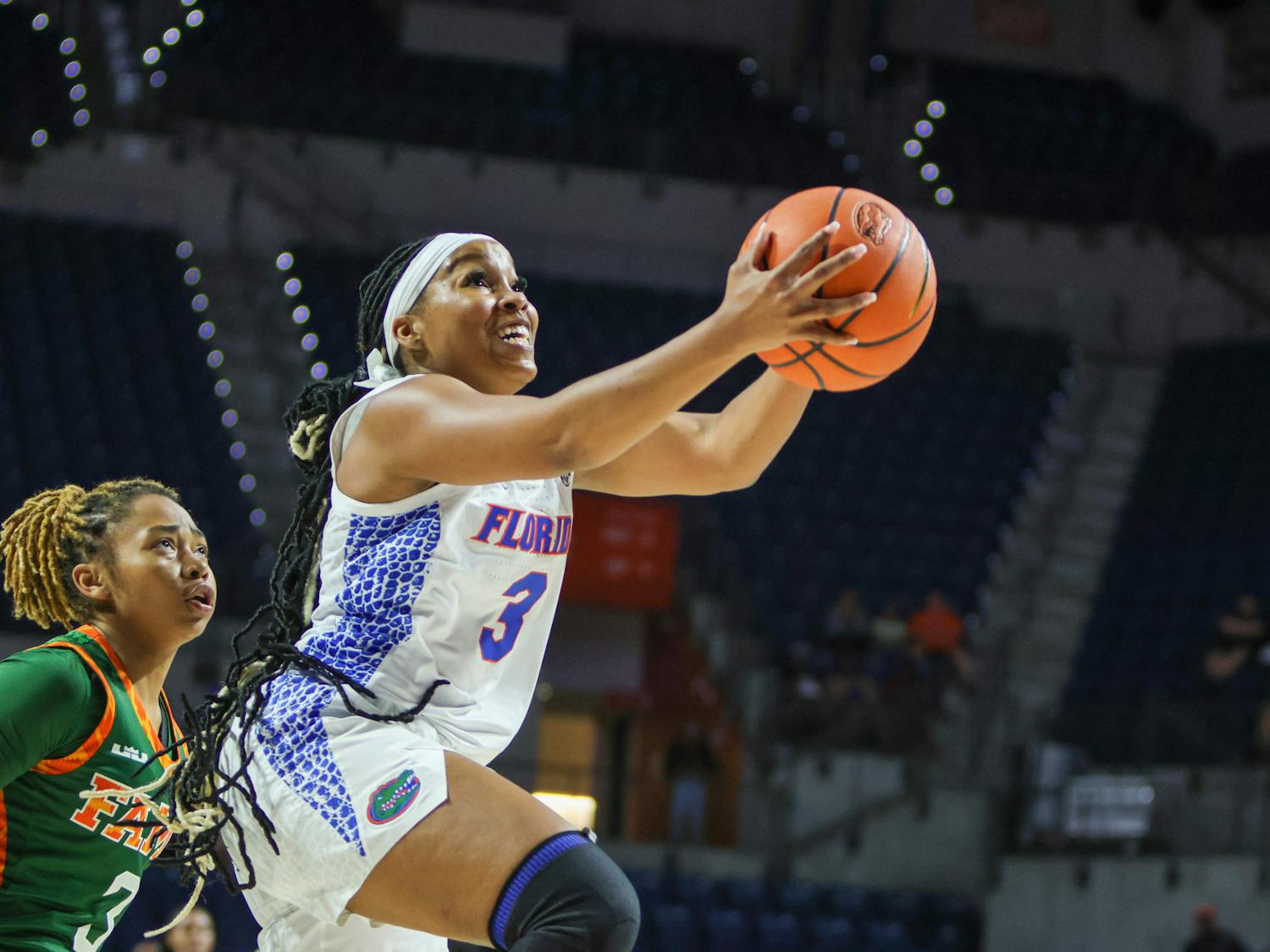 Florida guard KK Deans attacks the basket during the Gators game with Florida A&M Monday, Nov. 7, 2022. Deans lead UF in scoring with 23 points during its loss to the Florida State Seminoles Wednesday.