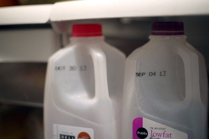 Expired milk sits in a fridge Wednesday afternoon. A recent study suggested food and drinks with expired labels may not be immediately inedible.