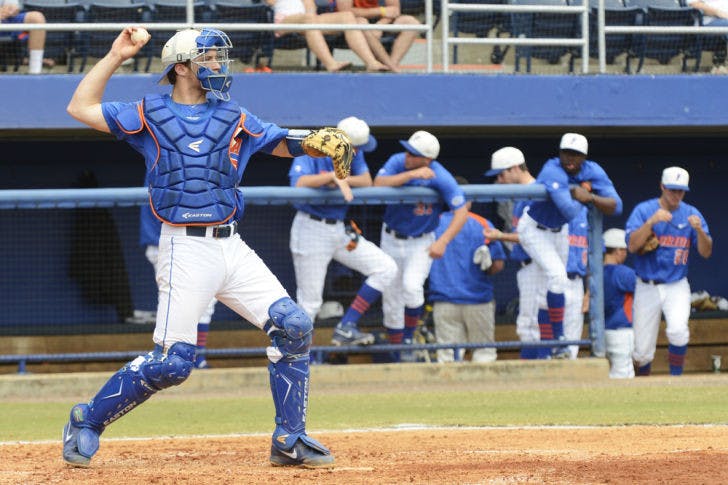 Catcher Taylor Gushue throws the ball back to the mound during warmups between innings in Florida’s 4-0 victory against Ole Miss on March 31 at McKethan Stadium.&nbsp;