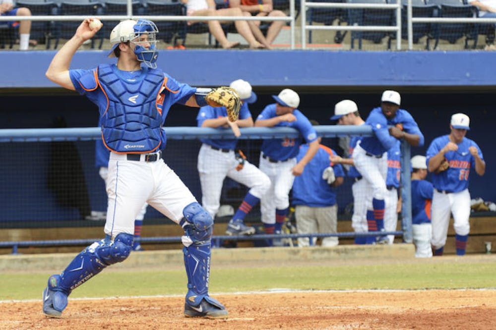 <p class="p1"><span class="s1">Catcher Taylor Gushue throws the ball back to the mound during warmups between innings in Florida’s 4-0 victory against Ole Miss on March 31 at McKethan Stadium.&nbsp;</span></p>