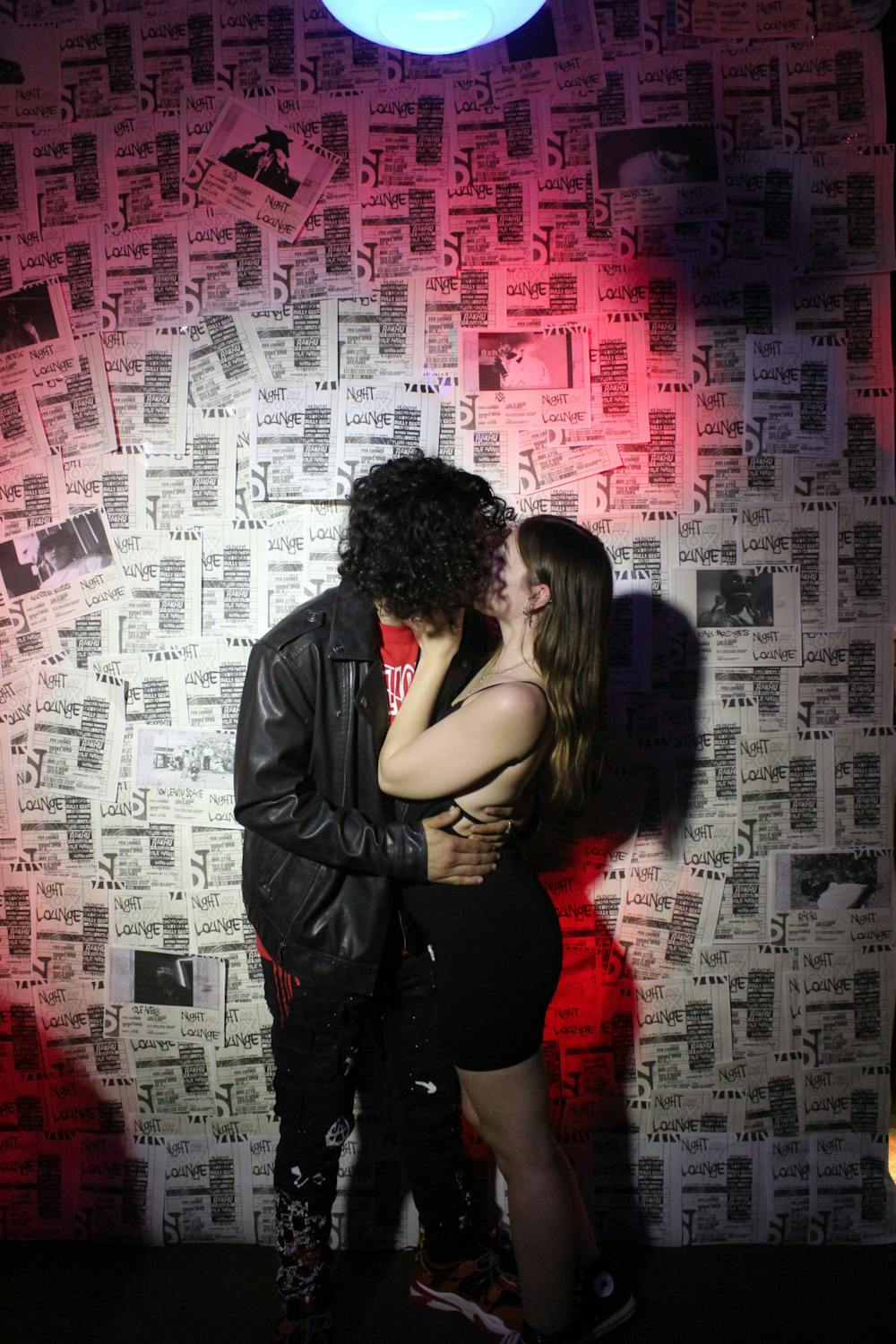 <p>Michael Corio, 20, and Desiree Kirschner, 20, kiss during the Night at Fox Lounge event Friday, May 27, 2022. </p>