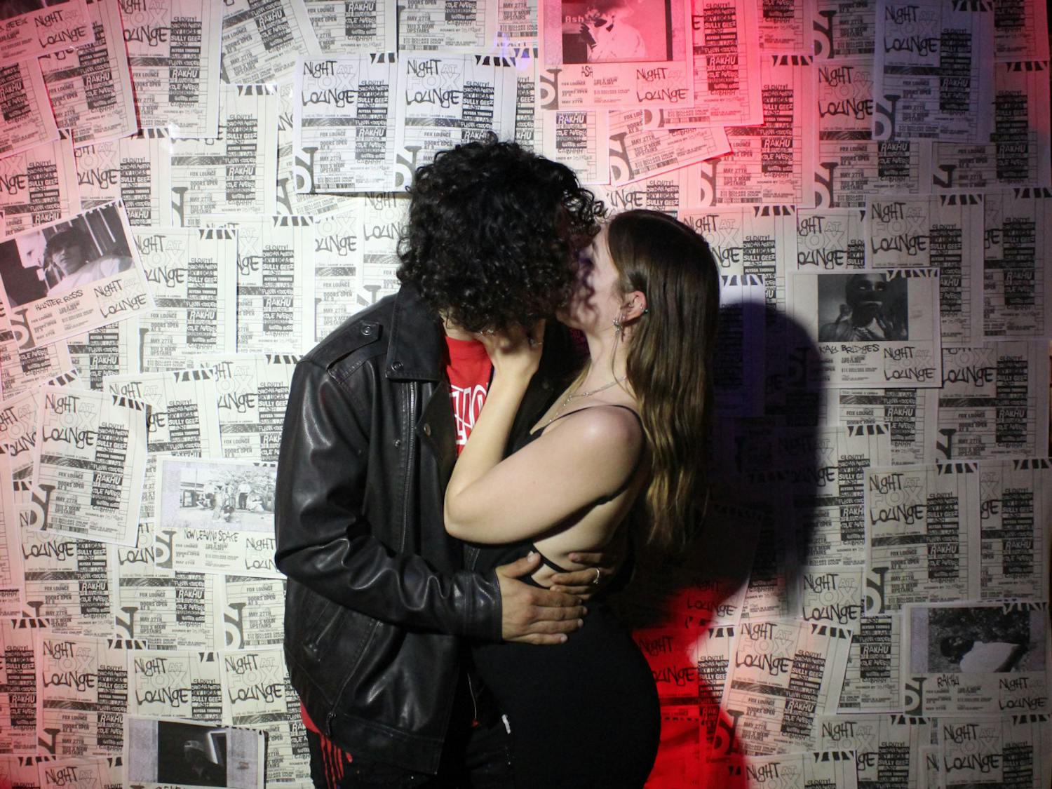 Michael Corio, 20, and Desiree Kirschner, 20, kiss during the Night at Fox Lounge event Friday, May 27, 2022. 