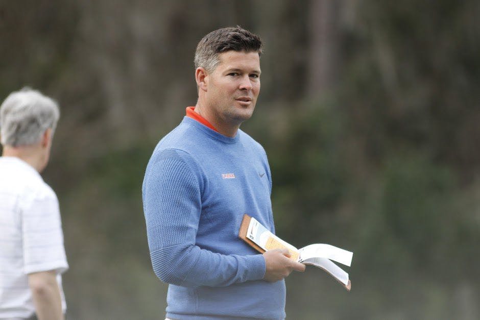 UF head coach JC Deacon holds a scorecard during the 2017 Gator Invitational. Deacon and the Gators head to Scottsdale, Arizona, for the National Championship.