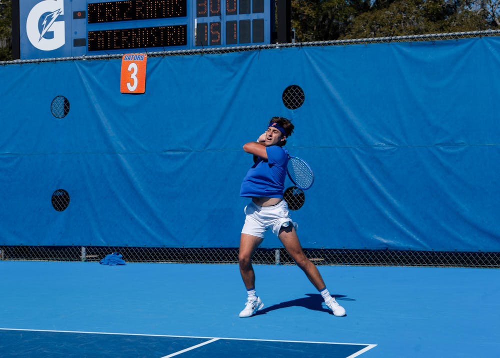Florida's Pablo Perez Ramos returns a hit during NCAA men's tennis match against Pablo Paternostro of Florida Gulf Coast Univeristy, Saturday, Feb. 7, 2026, in Gainesville, Fla.