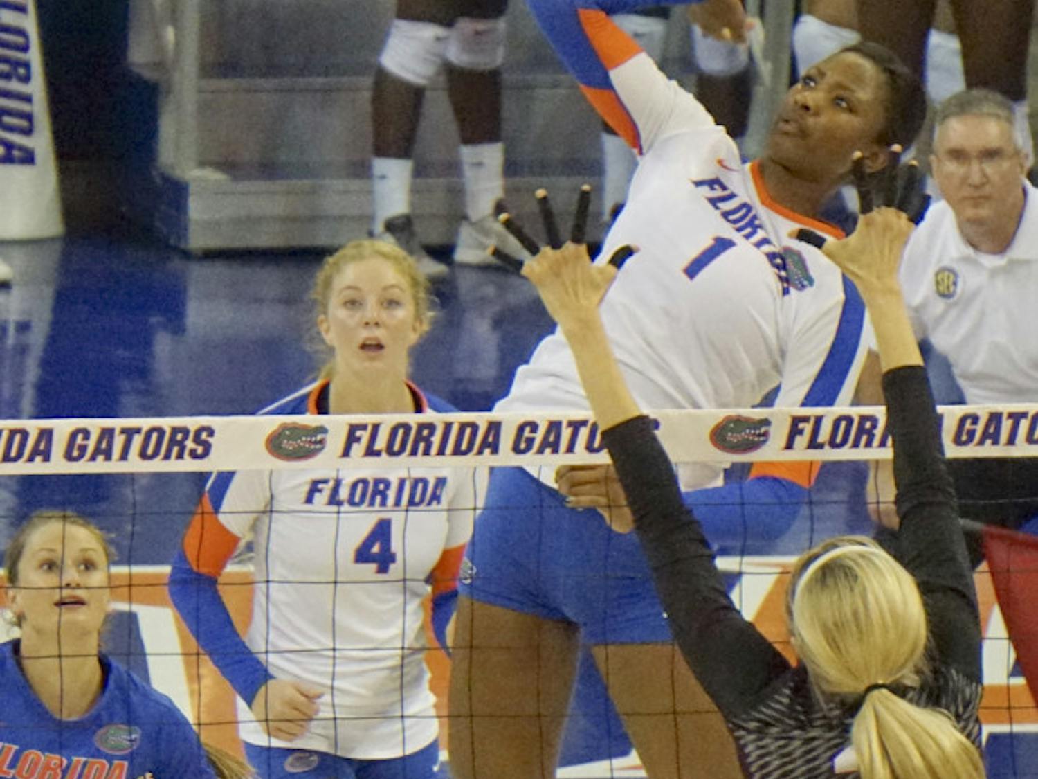 Rhamat Alhassan swings for a kill attempt during Florida's 3-0 win against Texas A&M on Oct. 9, 2015, in the O'Connell Center