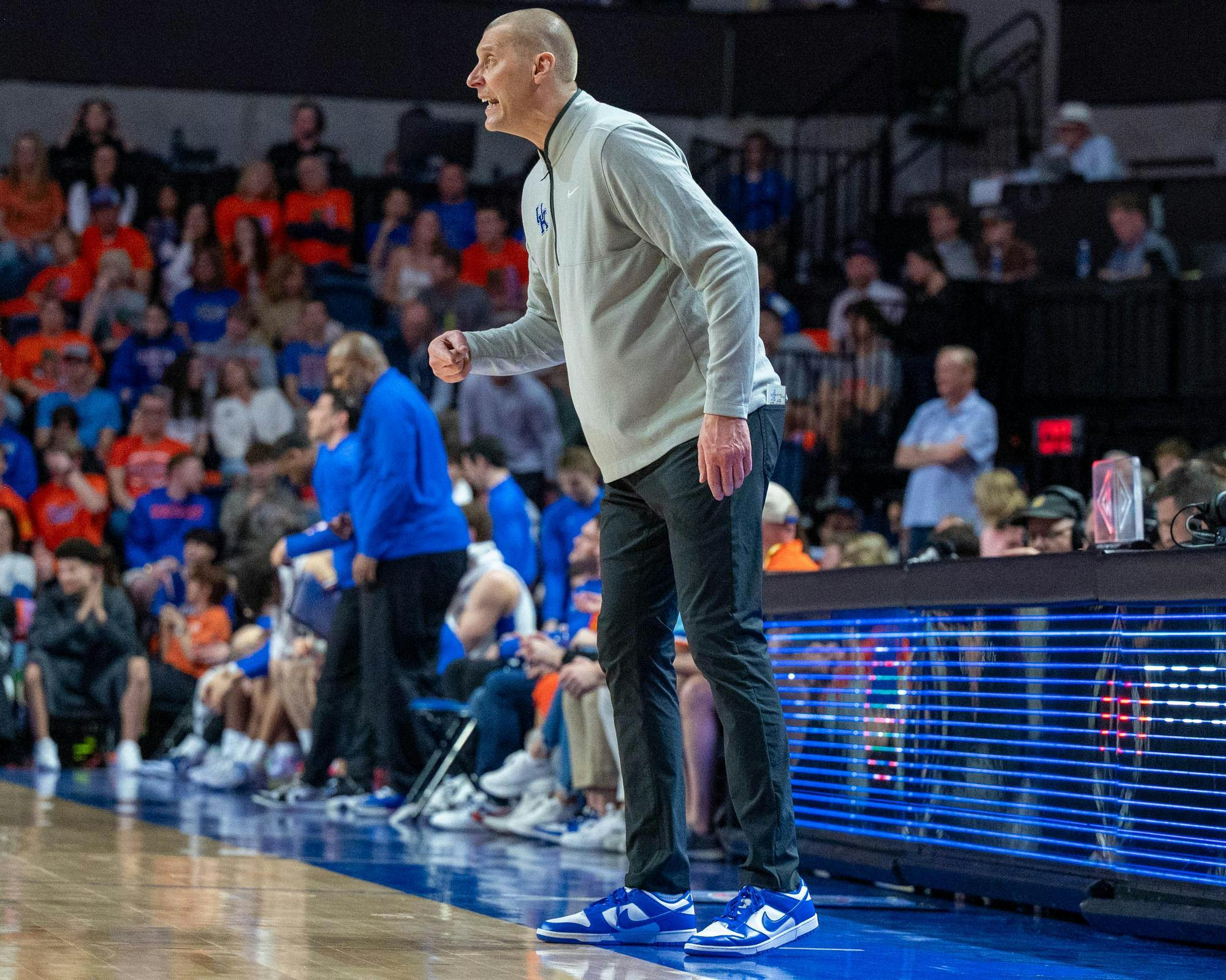 Kentucky head coach Mark Pop yells at his players during the first half of an NCAA college basketball game against Florida, Saturday, Feb. 14, 2026 at Exactech Arena in Gainesville, Fla.