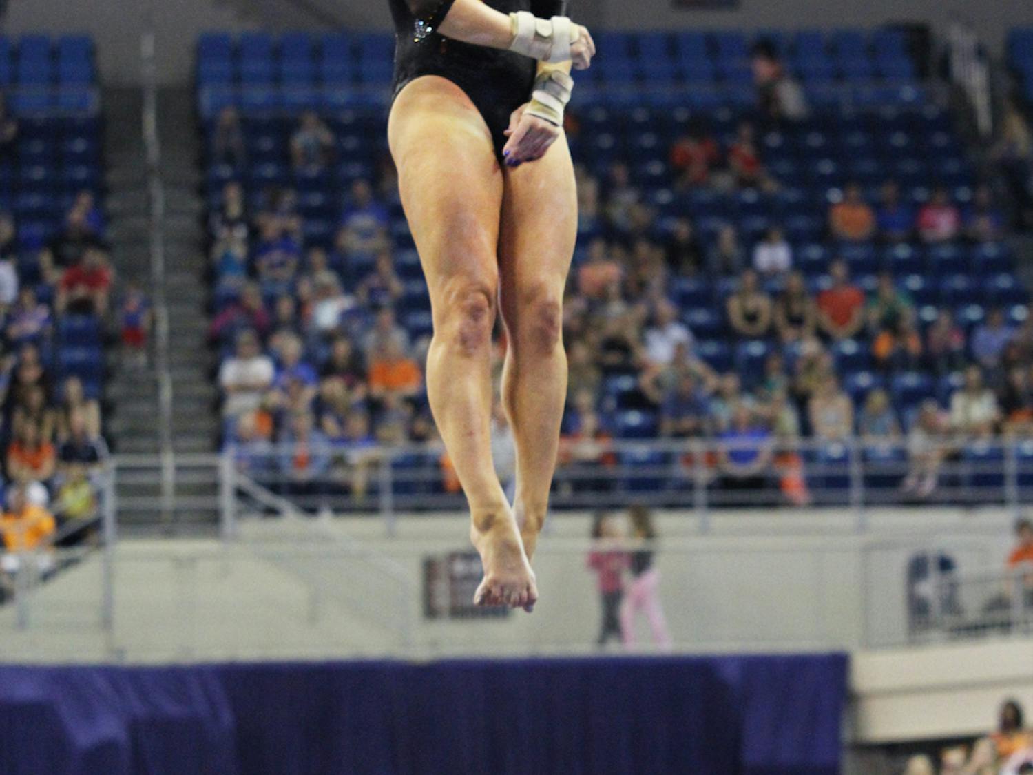 Bridget Sloan performs on vault in UF’s 196.975-196.075 win against UK on Feb. 22. Sloan and Kytra Hunter were the only Gators to stick their landings in vault at the SEC Championships on March 23.