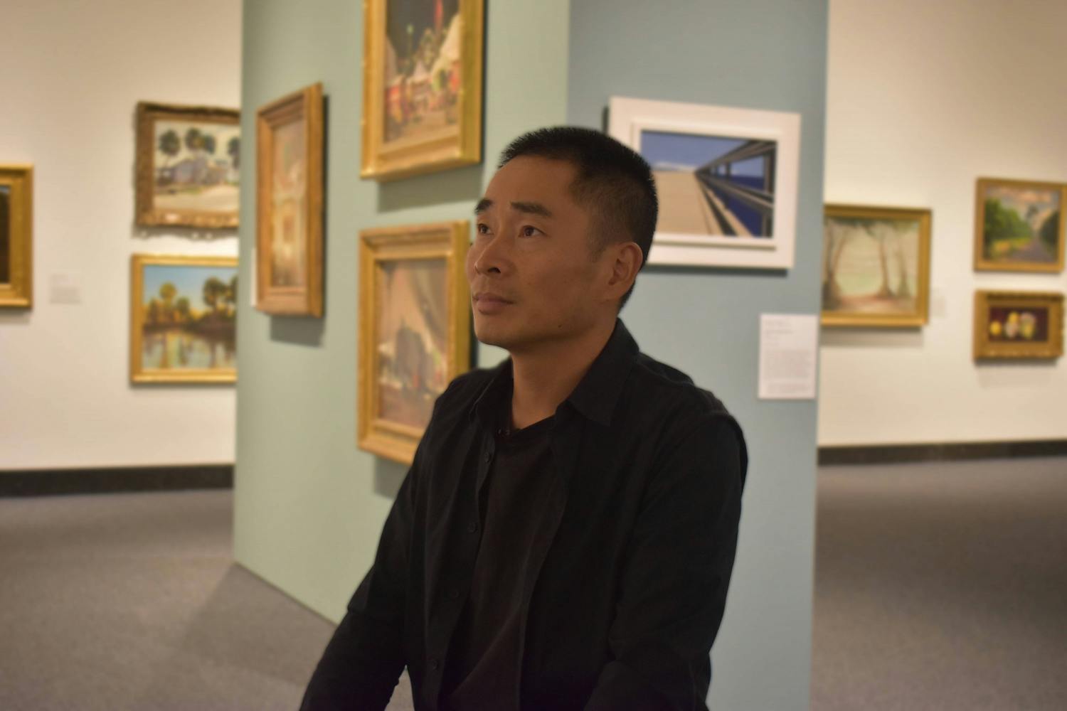 Tingquan Zhang, an artist, is seen at the Harn Museum of Art on Monday, November 14, 2022.