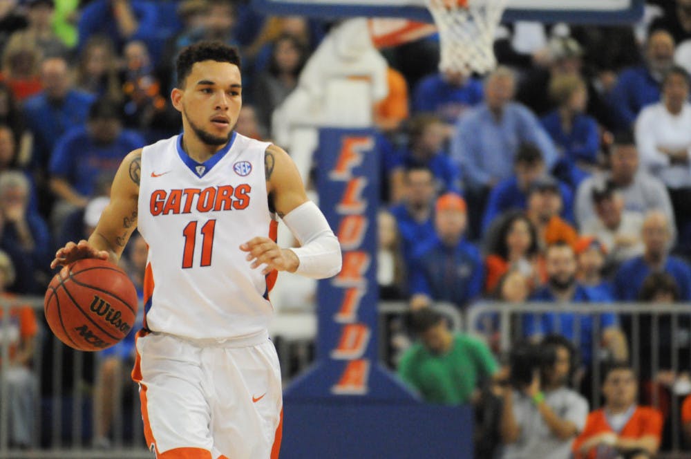 <p>UF point guard Chris Chiozza drives the ball down the court during Florida’s 77-63 win against Georgia on Jan.2, 2016, in the O’Connell Center.</p>