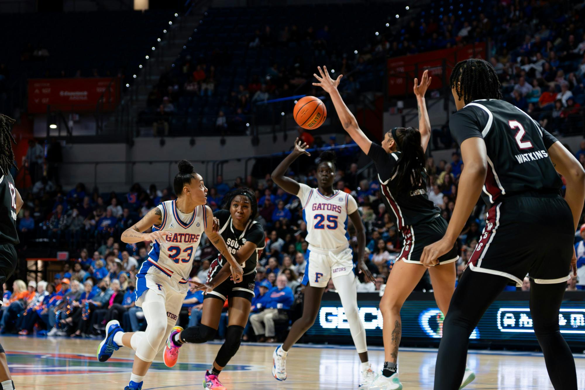 Senior guard Leilani Correa looks for a pass from senior forward Faith Dut in the Gators' 89-66 loss against the South Carolina Gamecocks.