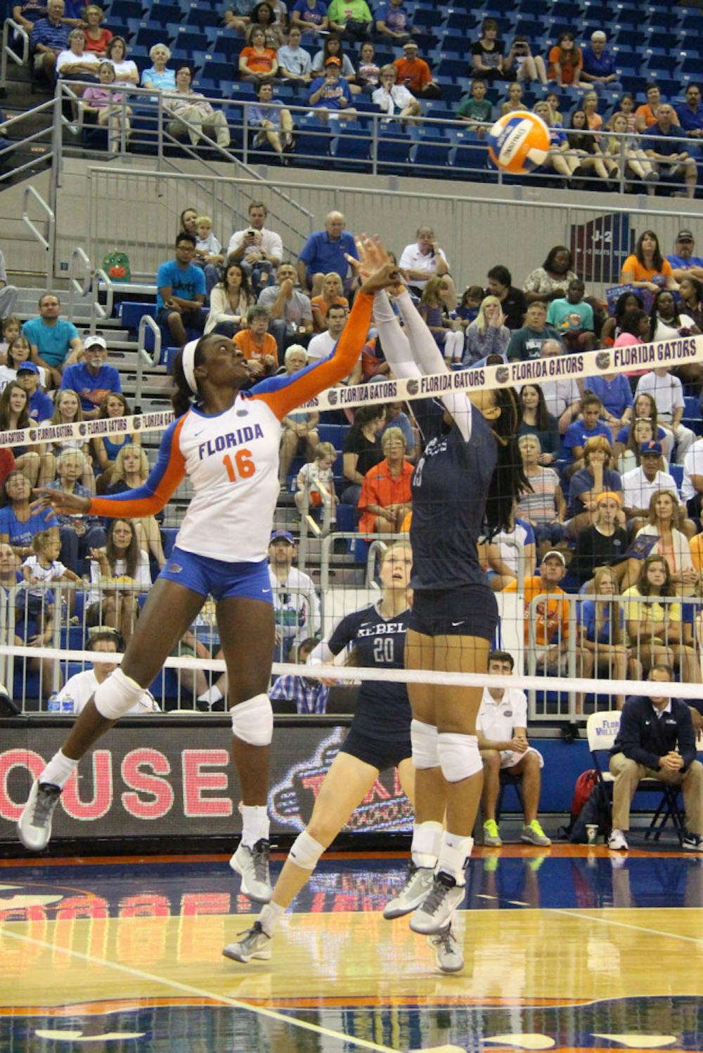 <p>Simone Antwi (16) hits the ball over the net for a kill attempt during Florida's 3-0 win against Ole Miss on Sunday in the O'Connell Center.</p>