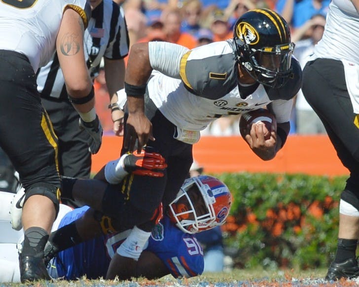 Florida defensive lineman Jonathan Bullard tackles Missouri quarterback James Franklin during Florida's 14-7 win on Saturday in Ben Hill Griffin Stadium. Bullard finished with 1.5 tackles for loss.