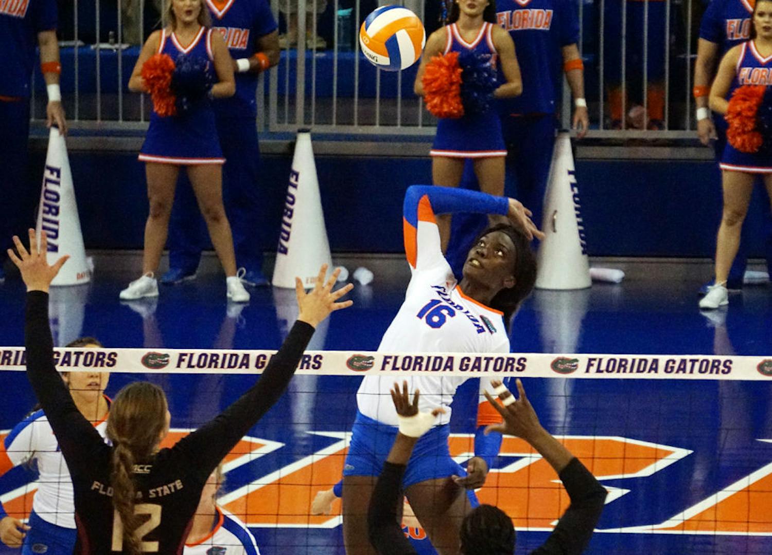 UF middle blocker Simone Antwi swings for a kill attempt during Florida's 3-1 win against Florida State on Sept. 20, 2015, in the O'Connell Center.