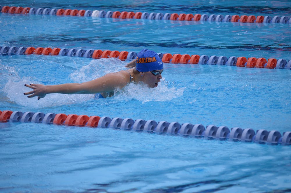 <p>Senior Elizabeth Beisel competes in the 200-yard butterfly during Florida's match against Auburn on Saturday.</p>