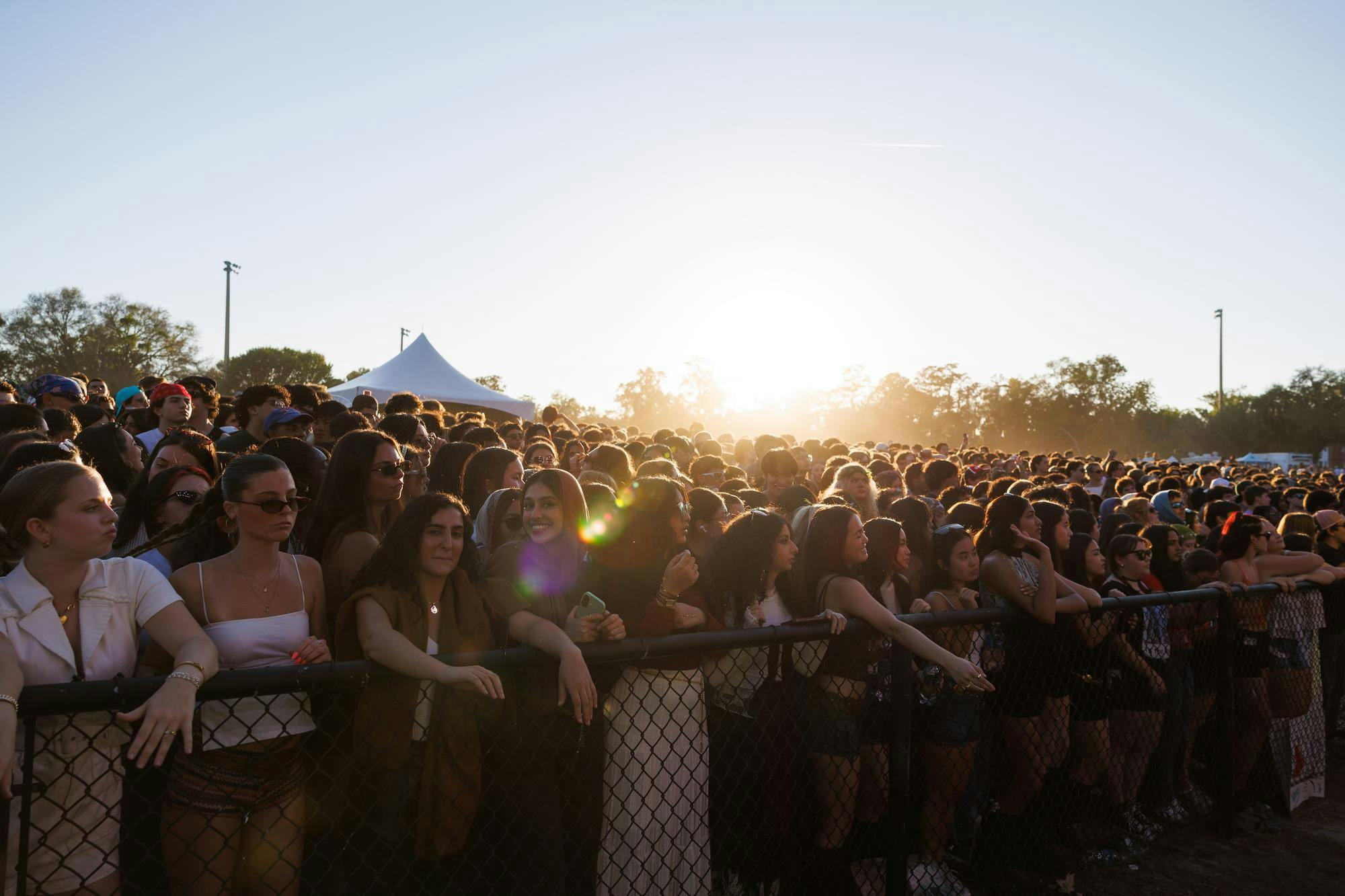 University of Florida students wait for the next song during SwampFest on Flavet Field, Tuesday, April 14, 2026, in Gainesville, Fla.
