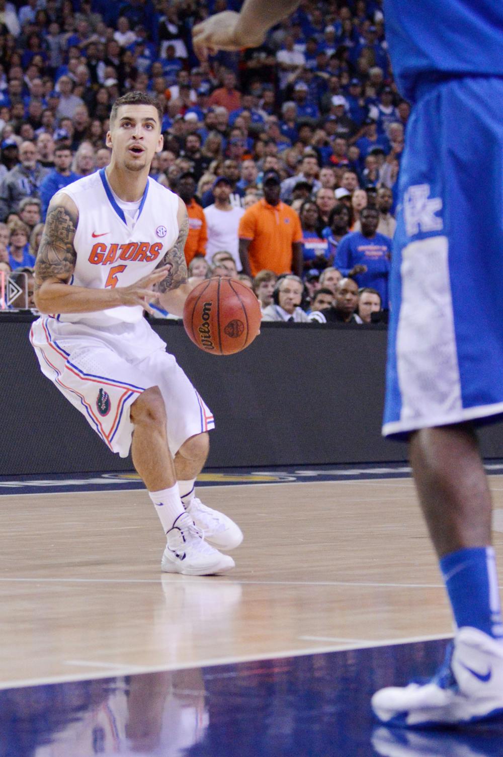 <p align="justify">Scottie Wilbekin prepares to shoot during Florida’s 61-60 win against Kentucky on March 16 in the Georgia Dome in Atlanta.</p>