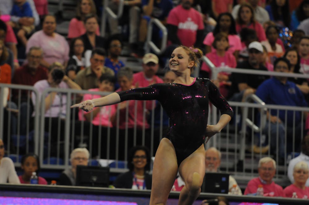 <p>Bridgette Caquatto performs her floor routine during Florida's win against Arkansas on Feb. 12, 2016, in the O'Connell Center.</p>
