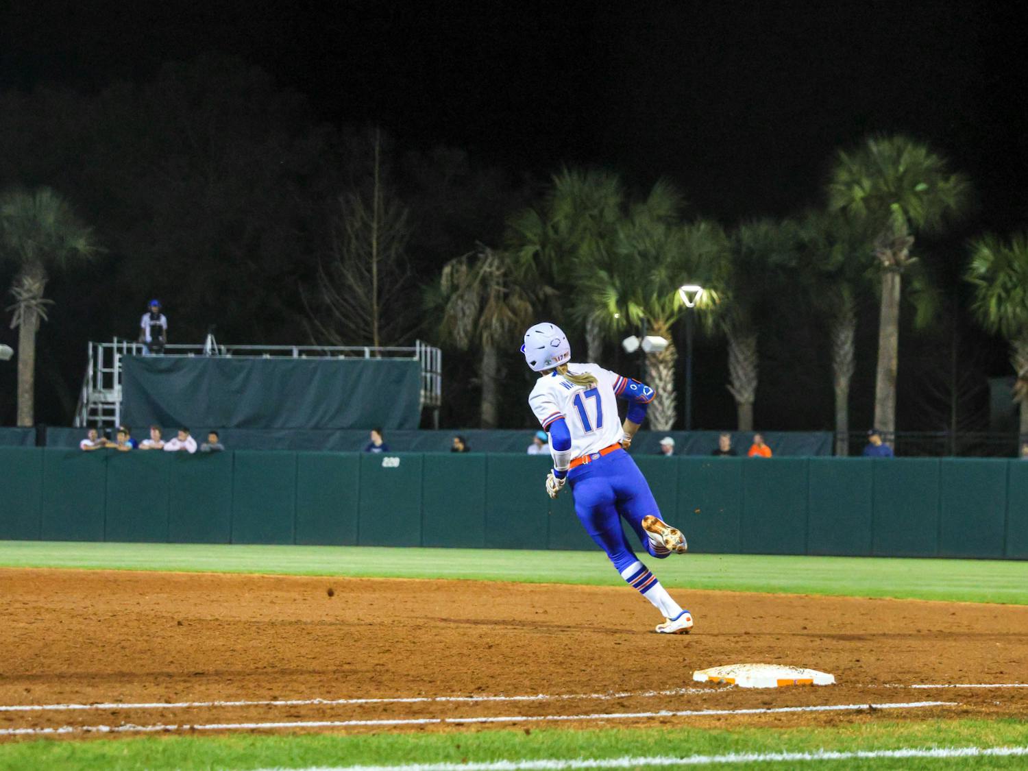 Shortstop Skylar Wallace rounds first base in an 11-0 victory against the Jacksonville Dolphins, Wednesday, Feb. 15, 2023.