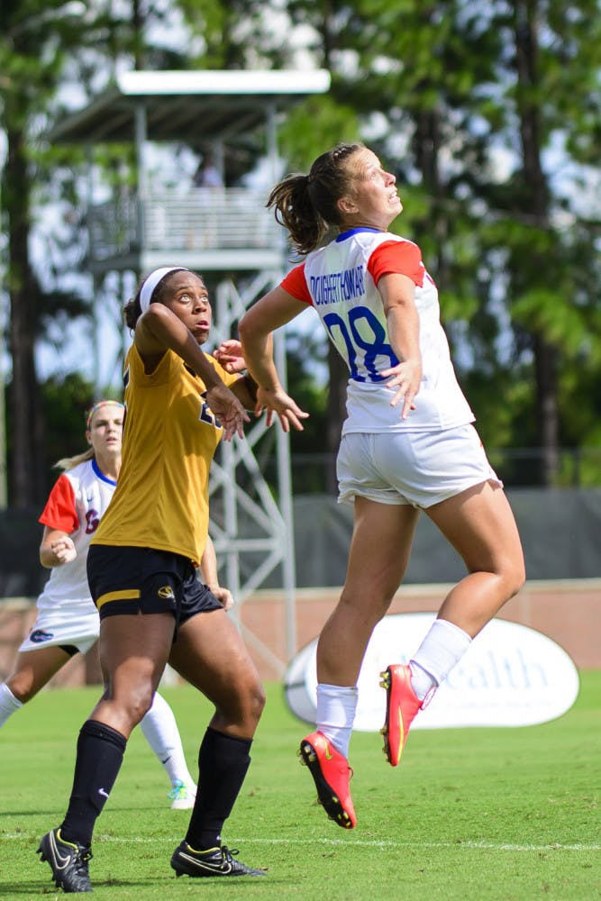 Meggie Dougherty Howard prepares to head a ball during Florida's 3-1 win against Missouri.