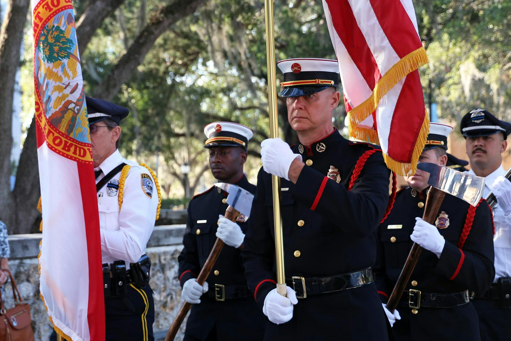 Gainesville Fire Rescue and Gainesville Police Department’s Joint Honor Guard present the American flag and Florida state flag during the Sept. 11 Remembrance Ceremony at Gainesville City Hall on Thursday, Sept. 11, 2025.