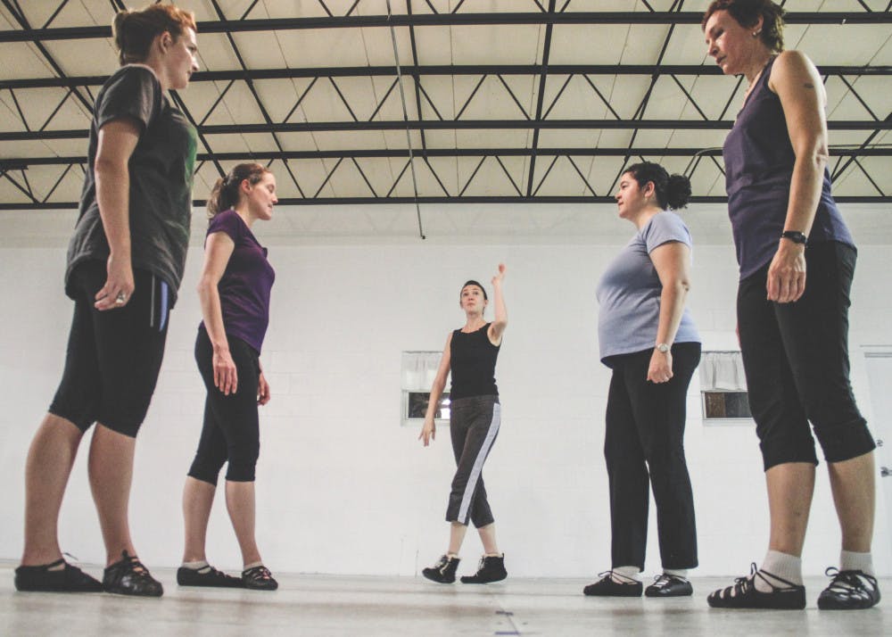 Allison Hogan, the head instructor at Hogan School of Irish Dance, discusses choreography with a team of four dancers on Tuesday afternoon. Hogan shares her love of Irish culture with students of all ages in the Gainesville area and offers private lessons upon request.