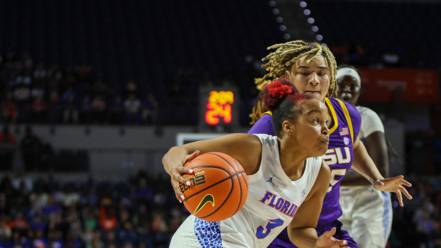 Senior guard KK Deans drives to the basket in a 90-79 defeat against the Louisiana State Tigers Sunday, Feb. 19, 2023. 