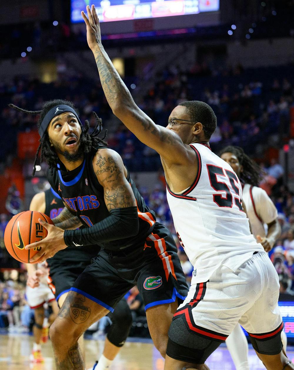 Florida guard Boogie Fland (0) below the basket during the second half of an NCAA college basketball game against Saint Francis, Wednesday, Dec. 17, 2025, in Gainesville, Fla.
