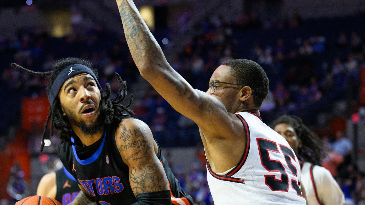 Florida guard Boogie Fland (0) below the basket during the second half of an NCAA college basketball game against Saint Francis, Wednesday, Dec. 17, 2025, in Gainesville, Fla.