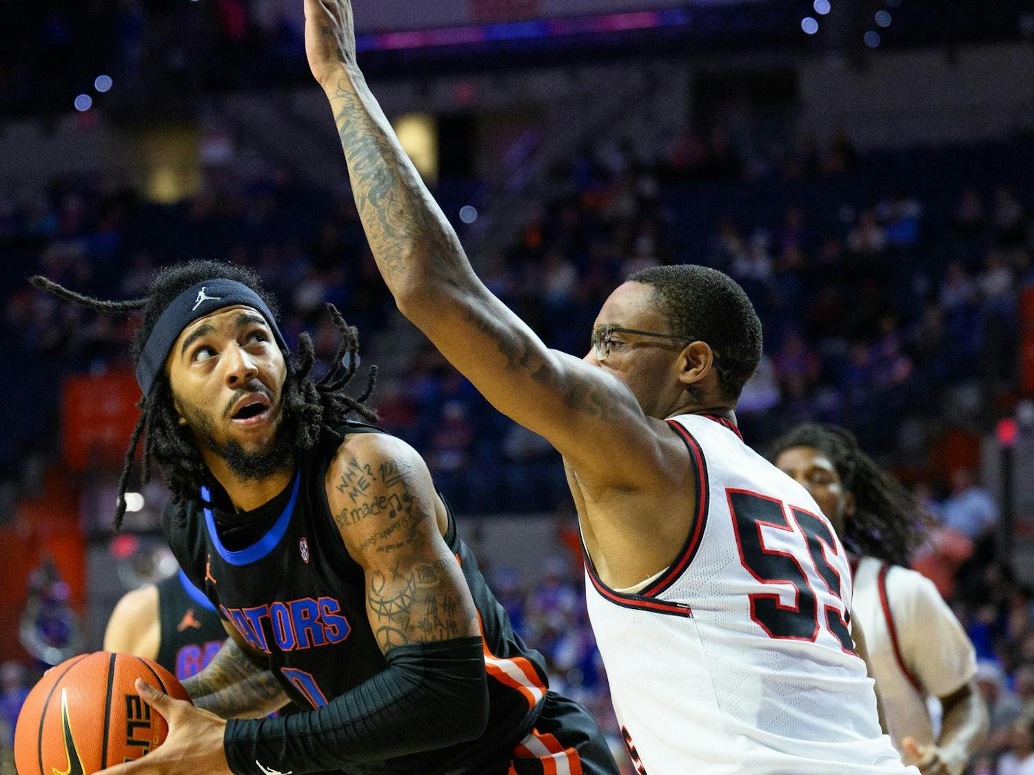Florida guard Boogie Fland (0) below the basket during the second half of an NCAA college basketball game against Saint Francis, Wednesday, Dec. 17, 2025, in Gainesville, Fla.