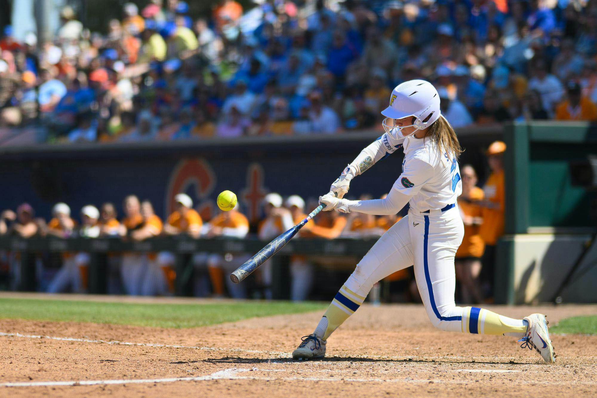 Florida outfielder Taylor Shumaker (21) hits during an NCAA softball game against Tennessee, Saturday, March 21, 2026, in Gainesville, Fla.