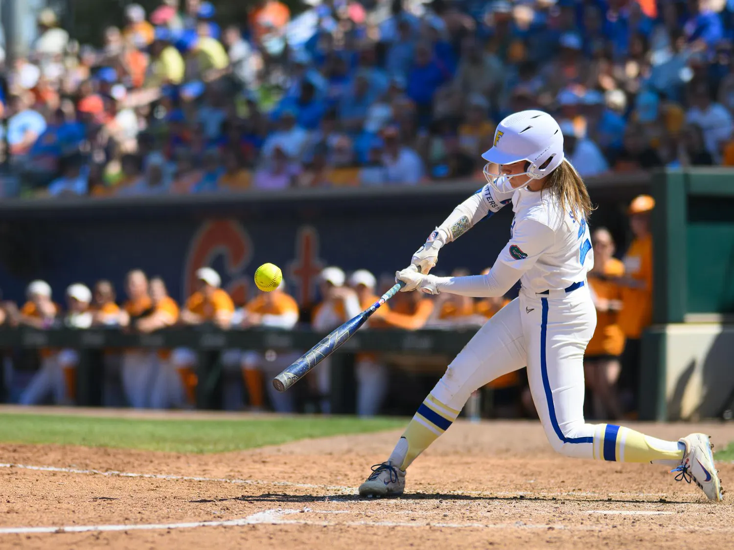 Florida outfielder Taylor Shumaker (21) hits during an NCAA softball game against Tennessee, Saturday, March 21, 2026, in Gainesville, Fla.