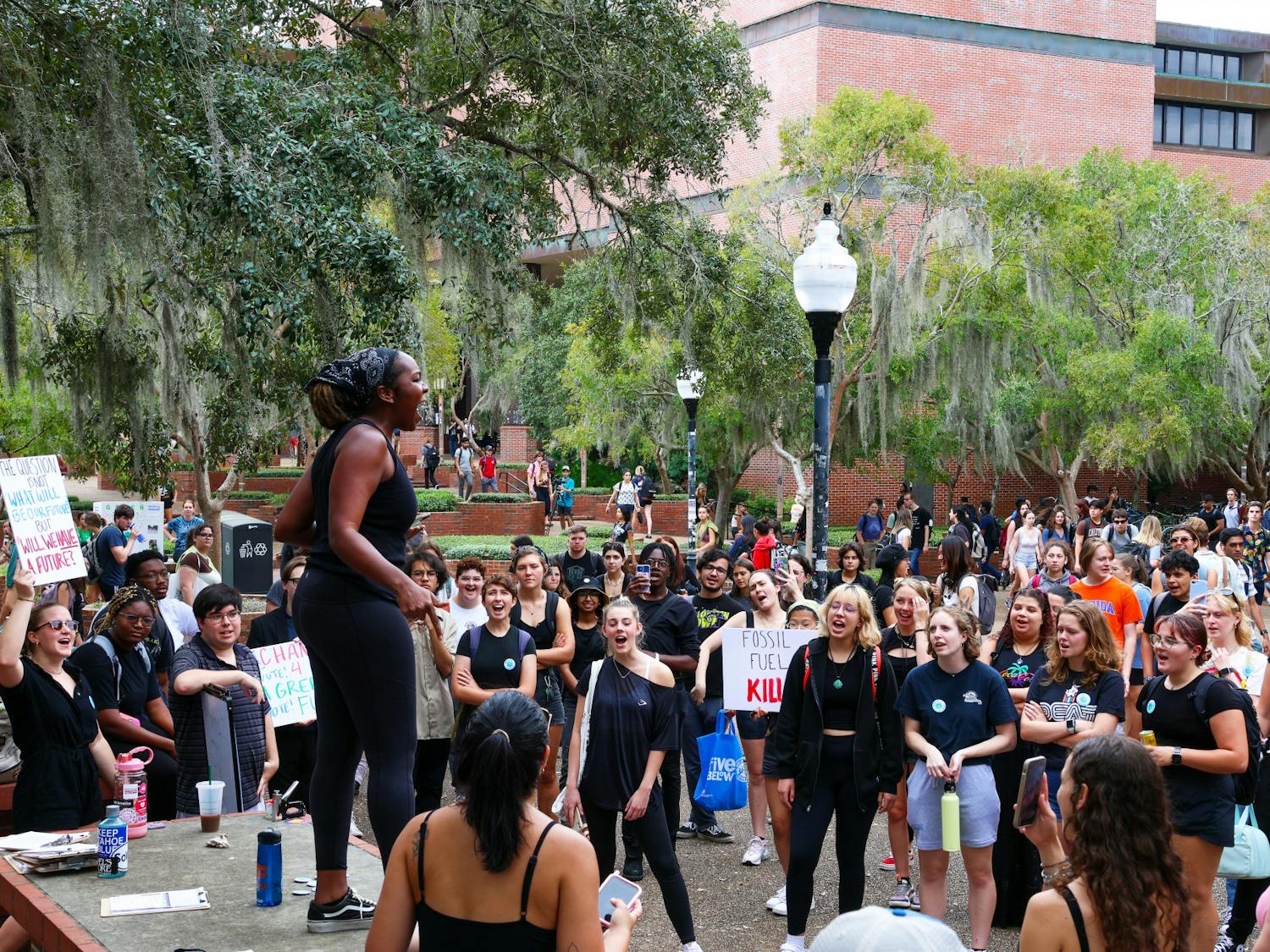 Kariel Stuart rallies students in Turlington Plaza to &quot;mourn the Earth&quot; in protest of climate change Friday, Sept. 23, 2022. 