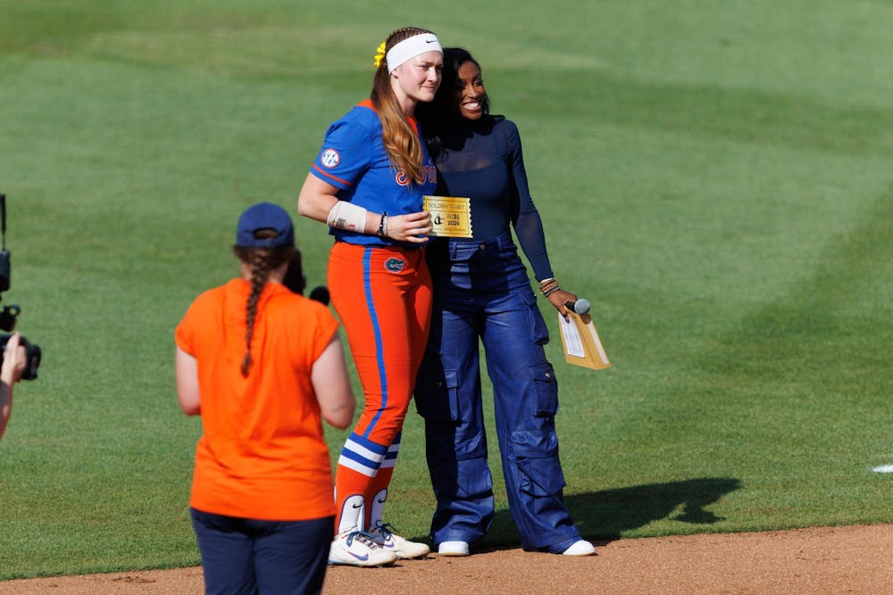 Florida catcher Jocelyn Erickson (8) is awarded a Athletes Unlimited Softball League golden ticket after an NCAA softball game against Auburn, Saturday, April 18, 2026, in Gainesville, Fla.