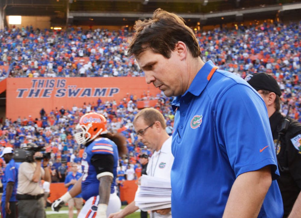 <p>Will Muschamp walks off the field following Florida’s 26-20 loss to Georgia Southern on Saturday in Ben Hill Griffin Stadium. The Gators’ loss to the Eagles was their first loss to a current FCS team since 1946.</p>