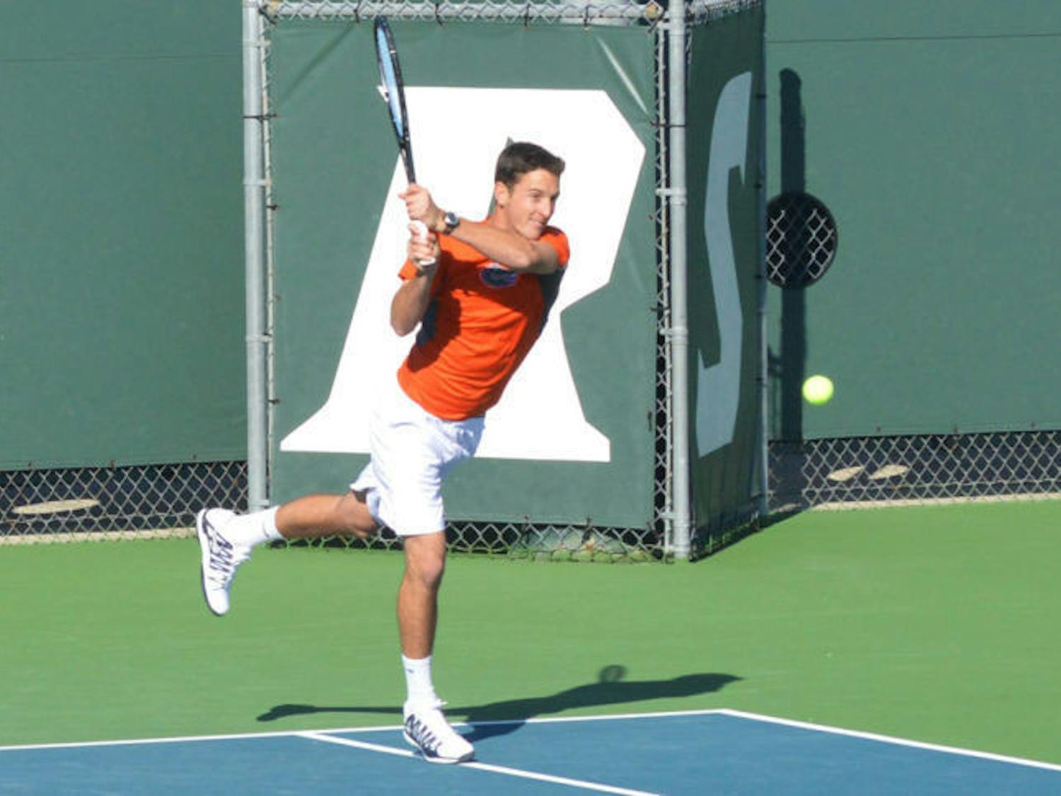 Gordon Watson returns a ball during Florida’s 5-2 win against North Florida on Jan. 22 at the Ring Tennis Complex.