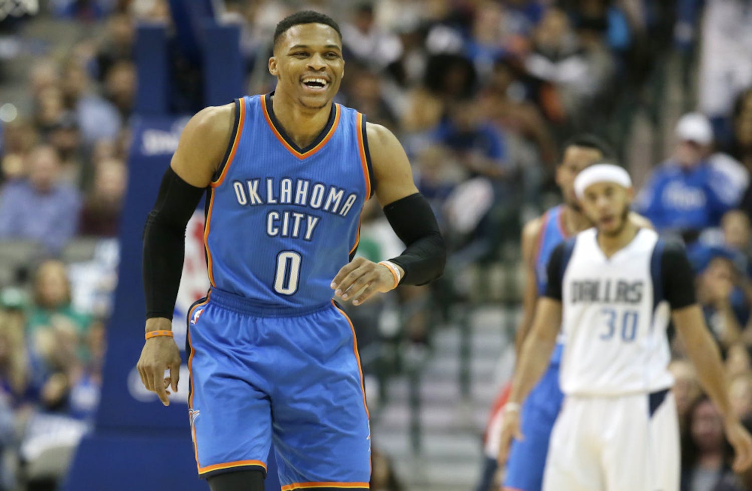 FILE - In this March 5, 2017, file photo, Oklahoma City Thunder guard Russell Westbrook (0) smiles on the court during the second half of an NBA basketball game against the Dallas Mavericks, in Dallas. Westbrook was once considered selfish and out of control. Now, he's harnessed his fury and competitive fire to become the ultimate teammate. (AP Photo/LM Otero, File)