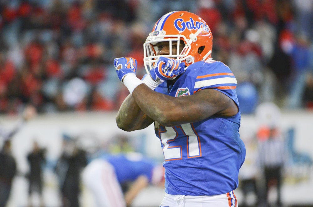 Kelvin Taylor celebrates during Florida’s 38-20 win over Georgia on Nov. 1, 2014,&nbsp;at Everbank Field in Jacksonville.