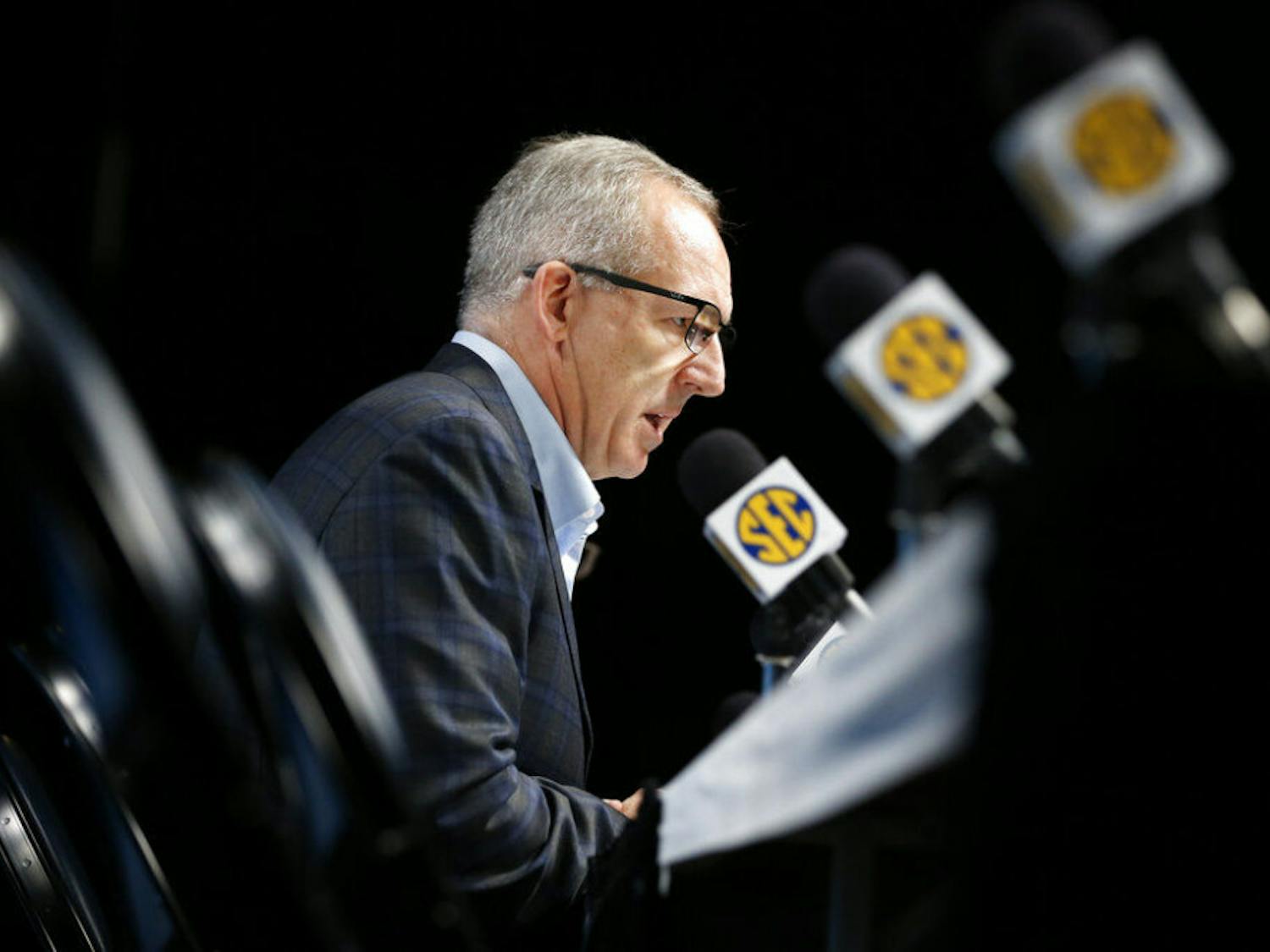 Greg Sankey, commissioner of the Southeastern Conference, talks about the decision to cancel the remaining games in the SEC NCAA college basketball tournament Thursday, March 12, 2020, in Nashville, Tenn. The conference tournament was cancelled Thursday due to coronavirus concerns. (AP Photo/Mark Humphrey)