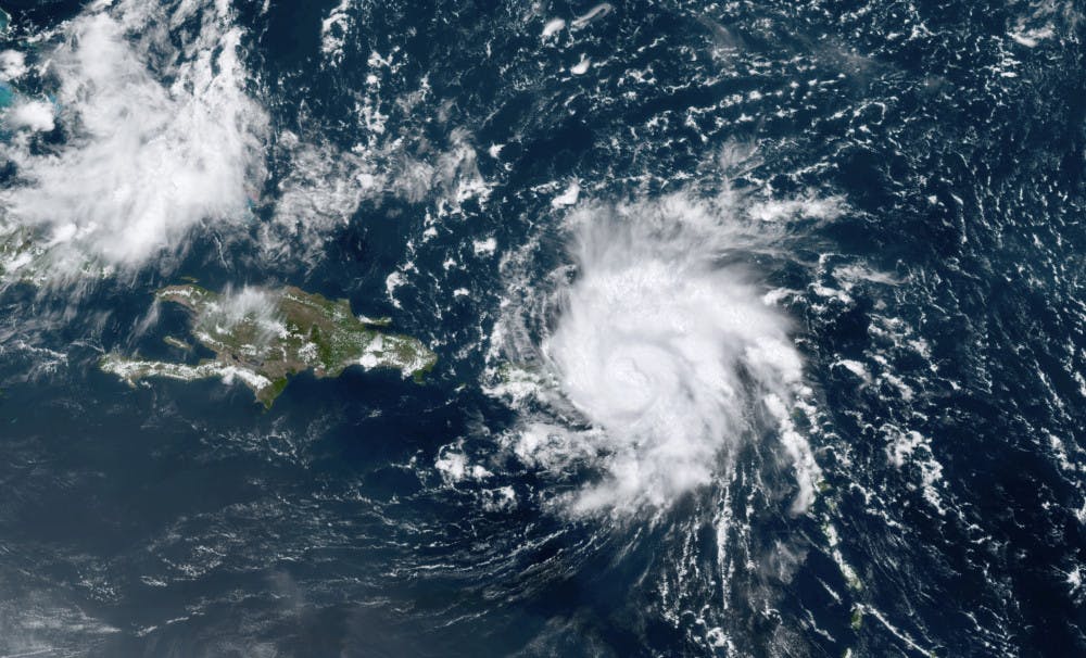 <p>This GOES-16 satellite image taken Wednesday, Aug. 28, 209, at 17:20 UTC and provided by National Oceanic and Atmospheric Administration (NOAA), shows Dorian, a Category 1 hurricane, crossing over the U.S. and British Virgin Islands. Forecasters say it could grow to Category 3 status as it nears the U.S. mainland as early as the weekend. (NOAA via AP)</p>