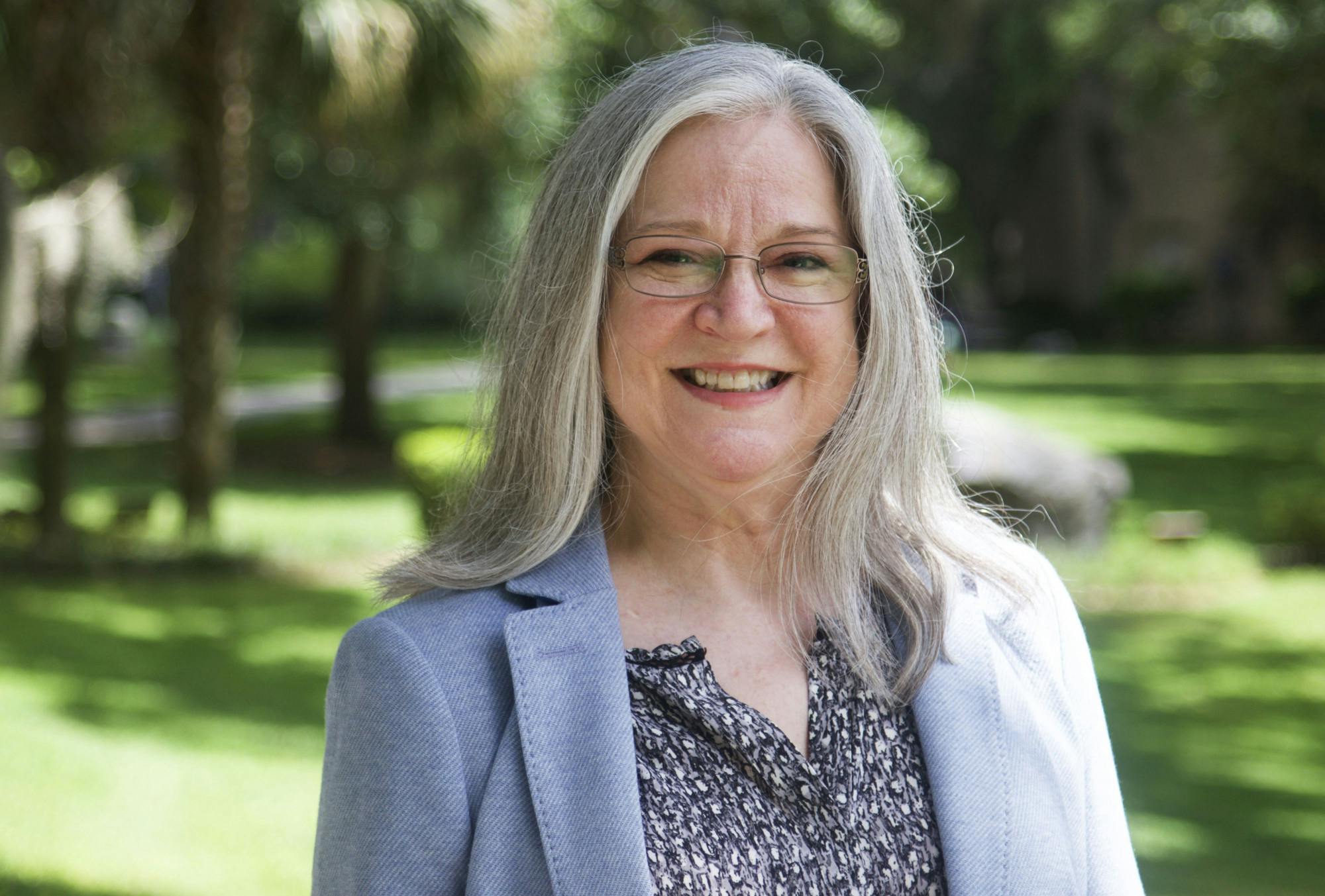 Lisa Armour, Santa Fe College's new interim provost, stands in the Rock Cycle Garden at Santa Fe College's northwest campus on Tuesday, June 8, 2021.