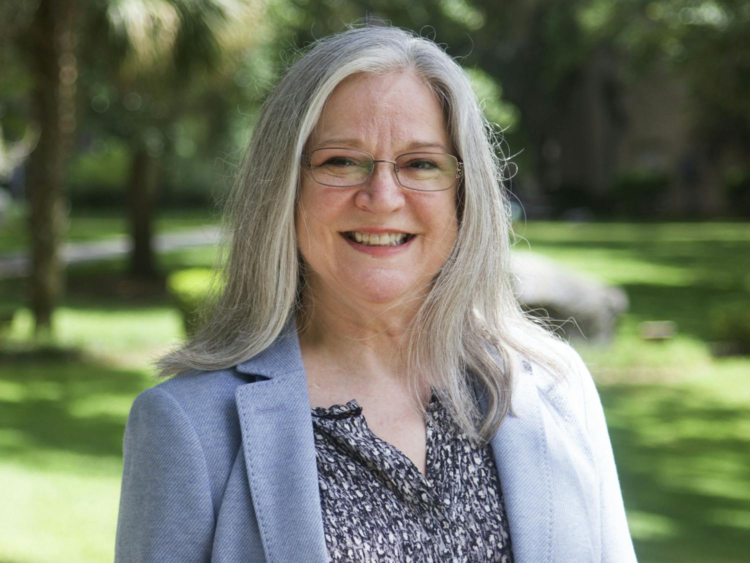 Lisa Armour, Santa Fe College's new interim provost, stands in the Rock Cycle Garden at Santa Fe College's northwest campus on Tuesday, June 8, 2021.