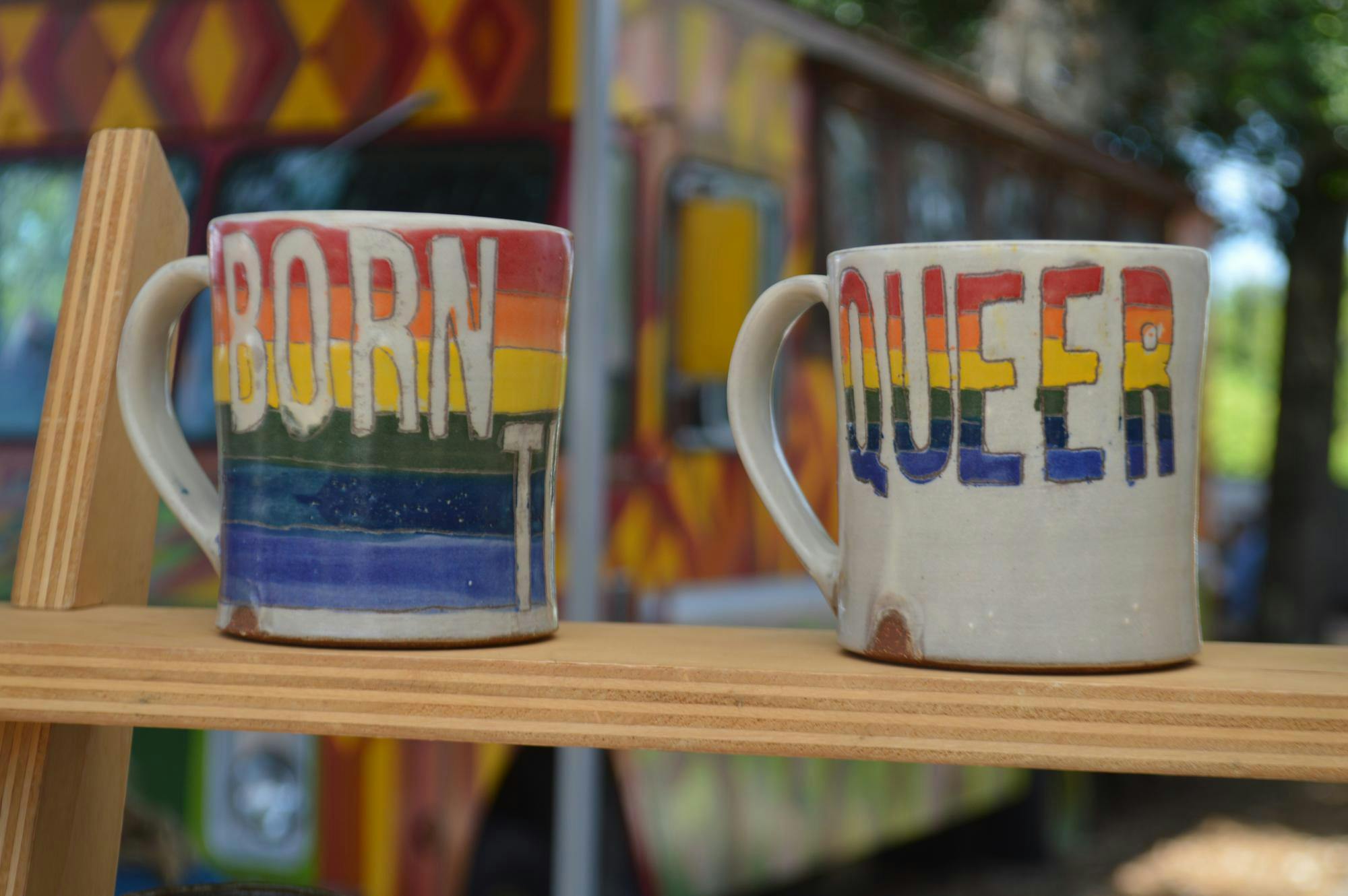 Mugs from Studio TM Ceramics wait to be purchased at the "Queer Makers Market" at 4th Ave Food Park in Gainesville, Fla., on Sunday, June 7, 2026. 
