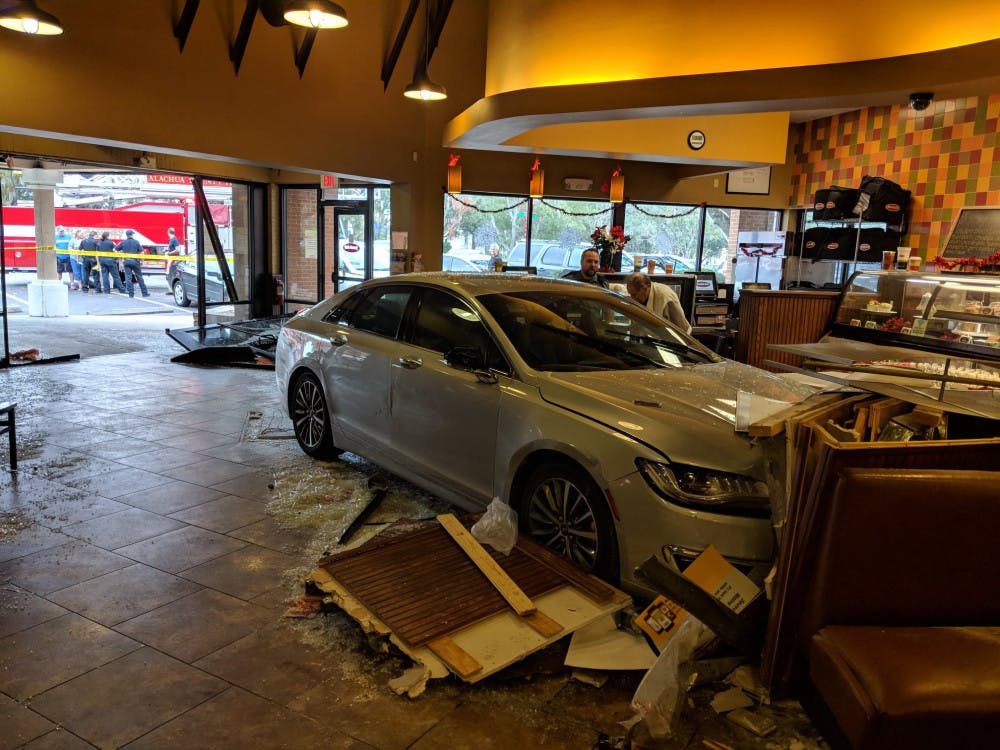 <p>A car crashed through the front of Jason’s Deli, at 6791 W Newberry Road, on Thursday around 3 p.m. Two customers were hit and seriously injured. Courtesy to The Alligator</p>